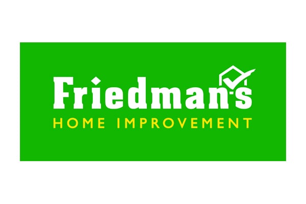 Green rectangular logo with the text "Friedman's HOME IMPROVEMENT" in white and yellow, with a checkmark above the letter "n" in "Friedman's.